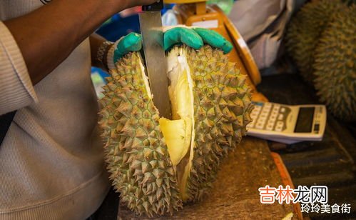 榴莲开口了但肉很硬没有香味,榴莲已经开口但闻不到香味怎么回事 榴莲没熟怎么存放熟得快