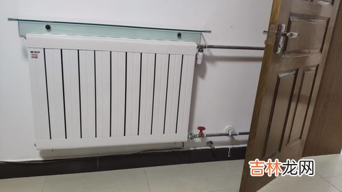 暖气片上可以烘衣服吗,暖气片上能放湿衣服吗