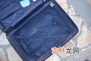 行李箱边上的卡扣是干嘛用的,拉杆箱上面的卡带是干什么用的?